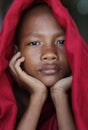 Young Burmese Buddhist novice in Mandalay, Myanmar.