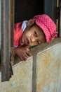 Portrait of a Burmese child with thanaka-painted face