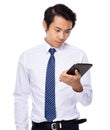 Young business asian man using his tablet Royalty Free Stock Photo