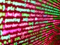 Young business crew working with startup. Data encryption security code on a computer display. Javascript functions, variables, Royalty Free Stock Photo