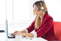 Young business girl using her computer.