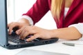 Young business girl using her computer.