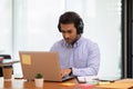 Young business indian man meeting with business team via video conference call at Home Royalty Free Stock Photo