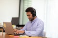 Young business indian man meeting with business team via video conference call at Home Royalty Free Stock Photo