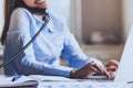 Young Business Lady Talking on Phone in Office. Royalty Free Stock Photo