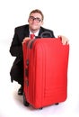 Young business man behind red luggage Royalty Free Stock Photo