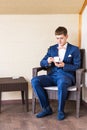 Young Business Man Drinking a Cup of Coffee or Tea Royalty Free Stock Photo