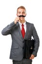 Young business man with fake mustaches Royalty Free Stock Photo
