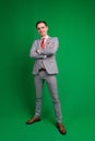 Young business man full body isolated on white and green background Royalty Free Stock Photo