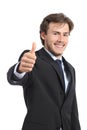 Young business man gesturing thumb up