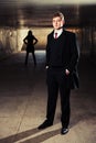 Young fashion business man in underground tunnel Royalty Free Stock Photo