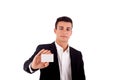 Young business man handing a blank business card over white back Royalty Free Stock Photo