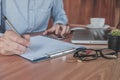 Young business man hands with pen writing Royalty Free Stock Photo