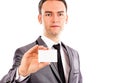 Young business man holding a blank business card Royalty Free Stock Photo