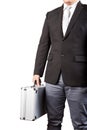 Young business man holding stong metal suitcase isolated white b