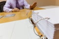 Young business man in the office sitting in front of the folder refuse to work rejects offer selective focus Royalty Free Stock Photo