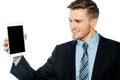 Young business man presenting new tablet pc Royalty Free Stock Photo