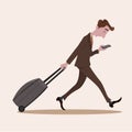 Young business man pulling the luggage busy with mobile phone Royalty Free Stock Photo