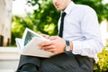 Young Business Man Reading Book Outdoor Royalty Free Stock Photo