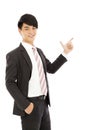 Young business man show something by gun posture Royalty Free Stock Photo