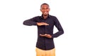Young business man showing plus size gesture smiling