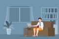 Young business man is sitting and working with laptop on the sofa at home. Online job in social for safety and to protect him from Royalty Free Stock Photo