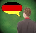 Young business man speaking german on school board Royalty Free Stock Photo