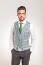 Young business man standing with his hands in pockets Royalty Free Stock Photo
