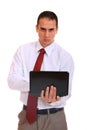 Young business man standing with laptop Royalty Free Stock Photo