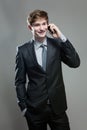 Young business man talking on cell phone Royalty Free Stock Photo