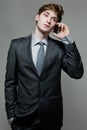 Young business man talking on cell phone Royalty Free Stock Photo