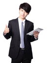 Young business man thumb up with touch pad Royalty Free Stock Photo