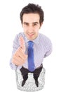 Young business man thumbs-up inside a glass Royalty Free Stock Photo