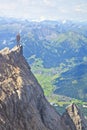 Young business man on top of mountain Royalty Free Stock Photo