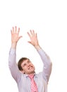 Young business man trying to grab something Royalty Free Stock Photo
