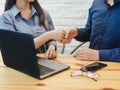 Young business man and woman shaking hands for Coworking. Teamwork, Business Partner Concept Royalty Free Stock Photo