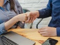 Young business man and woman shaking hands for Coworking. Teamwork, Business Partner Concept Royalty Free Stock Photo