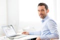 Young business man working at home on his laptop Royalty Free Stock Photo