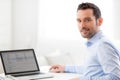 Young business man working at home on his laptop Royalty Free Stock Photo