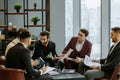 Young business men hold meeting in office Royalty Free Stock Photo