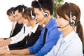 Young business people and colleagues working in call center Royalty Free Stock Photo