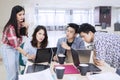 Young business people discussing in the office Royalty Free Stock Photo