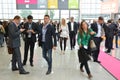 Young business people on german trade show