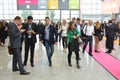 Young business people on german trade show