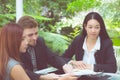 Young business people making meeting and talking for analyzing marketing working at office on desk. Royalty Free Stock Photo