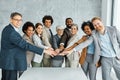 young business people meeting office portrait diversity teamwork group connection success holding hands unity senior Royalty Free Stock Photo