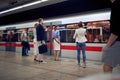 Young business people at subway station waiting for a train Royalty Free Stock Photo