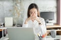 Young business people are suffering from headaches,Asian women S