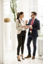 Young business people with digital tablet in the office Royalty Free Stock Photo