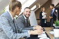 Young business people working on their desktop computers at the modern office space Royalty Free Stock Photo